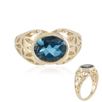 Bague en or et Topaze bleu de Londres (Ornaments by de Melo)